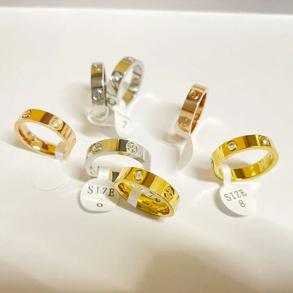 Unisex Stainless Steel Love Rings with Crystal Accents